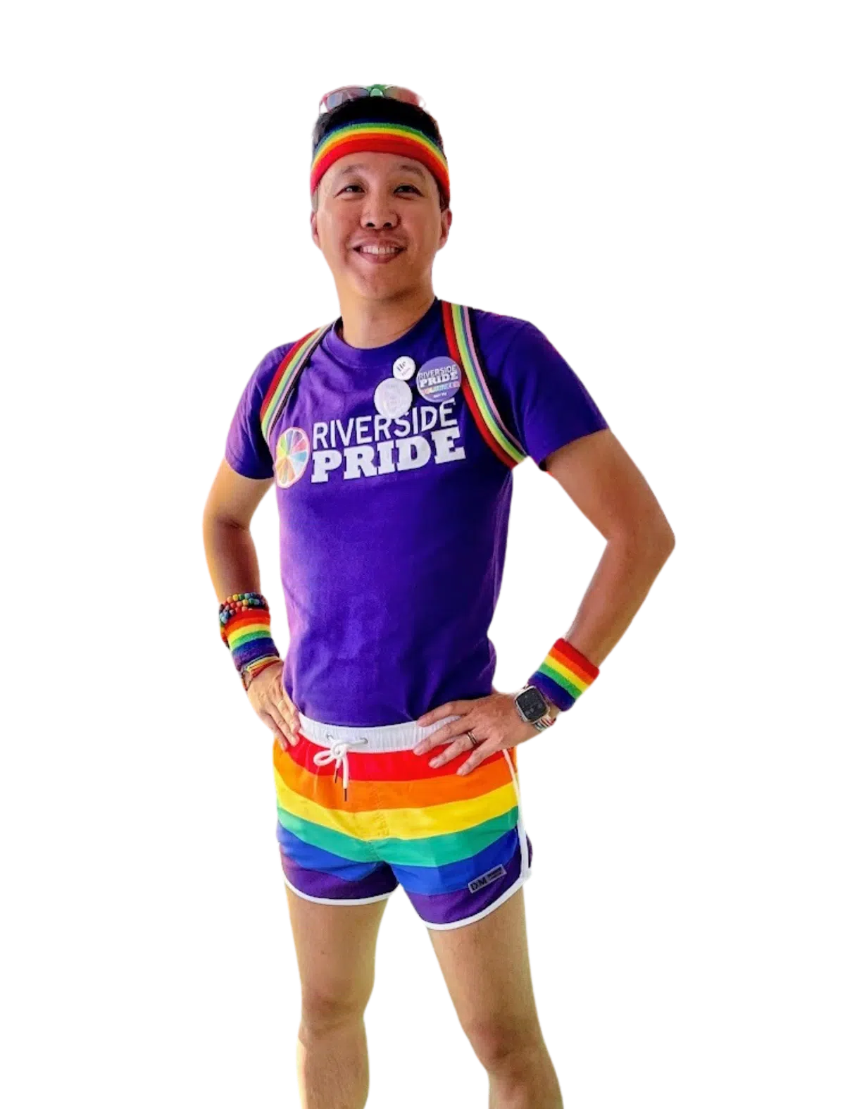 Ray volunteering at Riverside Pride wearing a Pride t-shirt and rainbow shorts